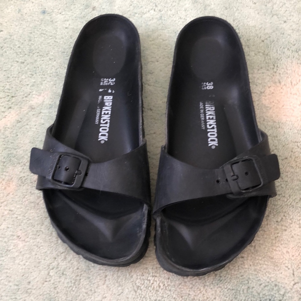 Black Birkenstock sandals.